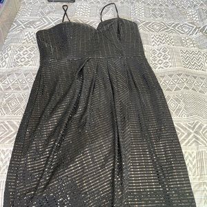 Black sequined dress by Alexa B Nites